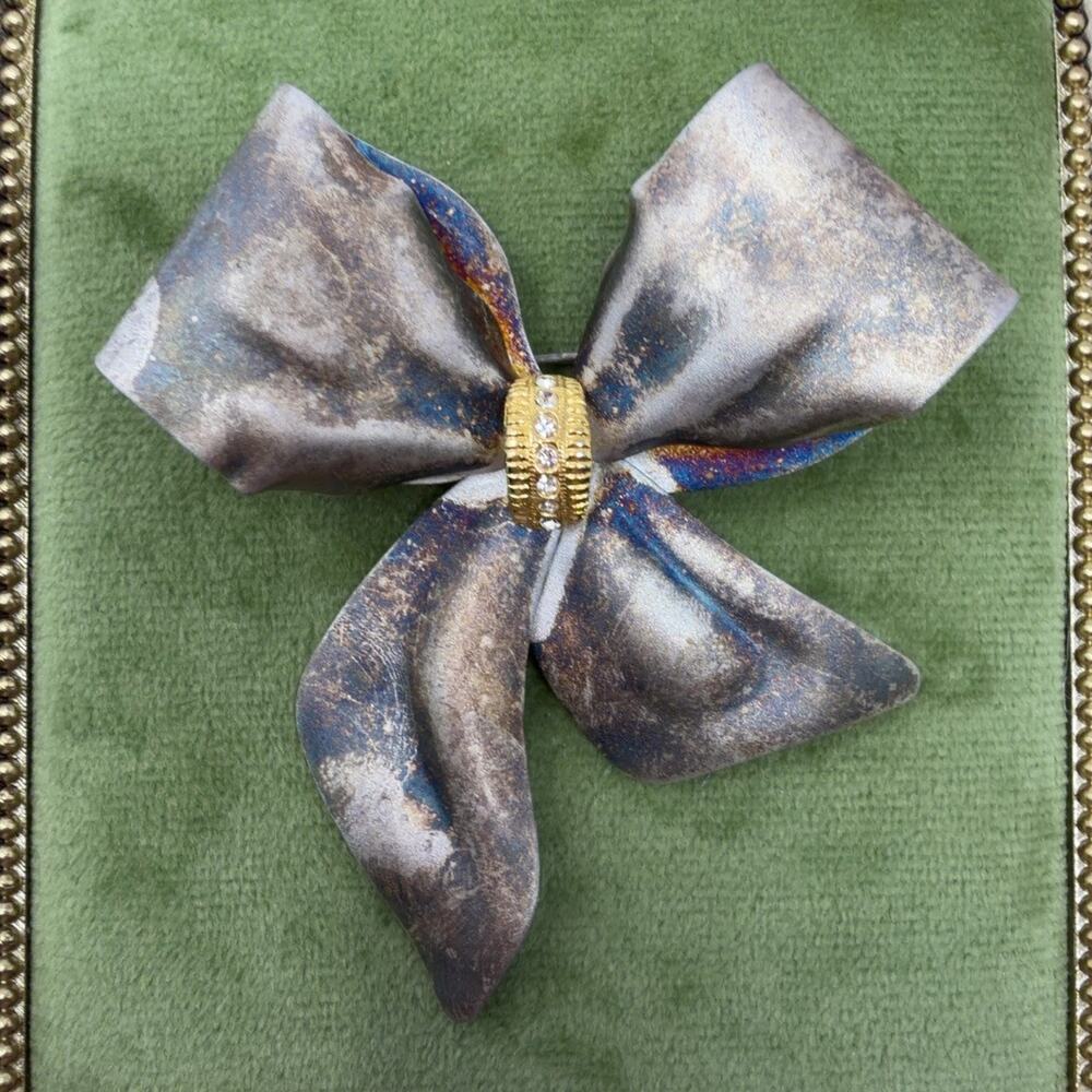 Vintage Iridescent Anodized Metal Bow Brooch Rhinestone Center 2.5in